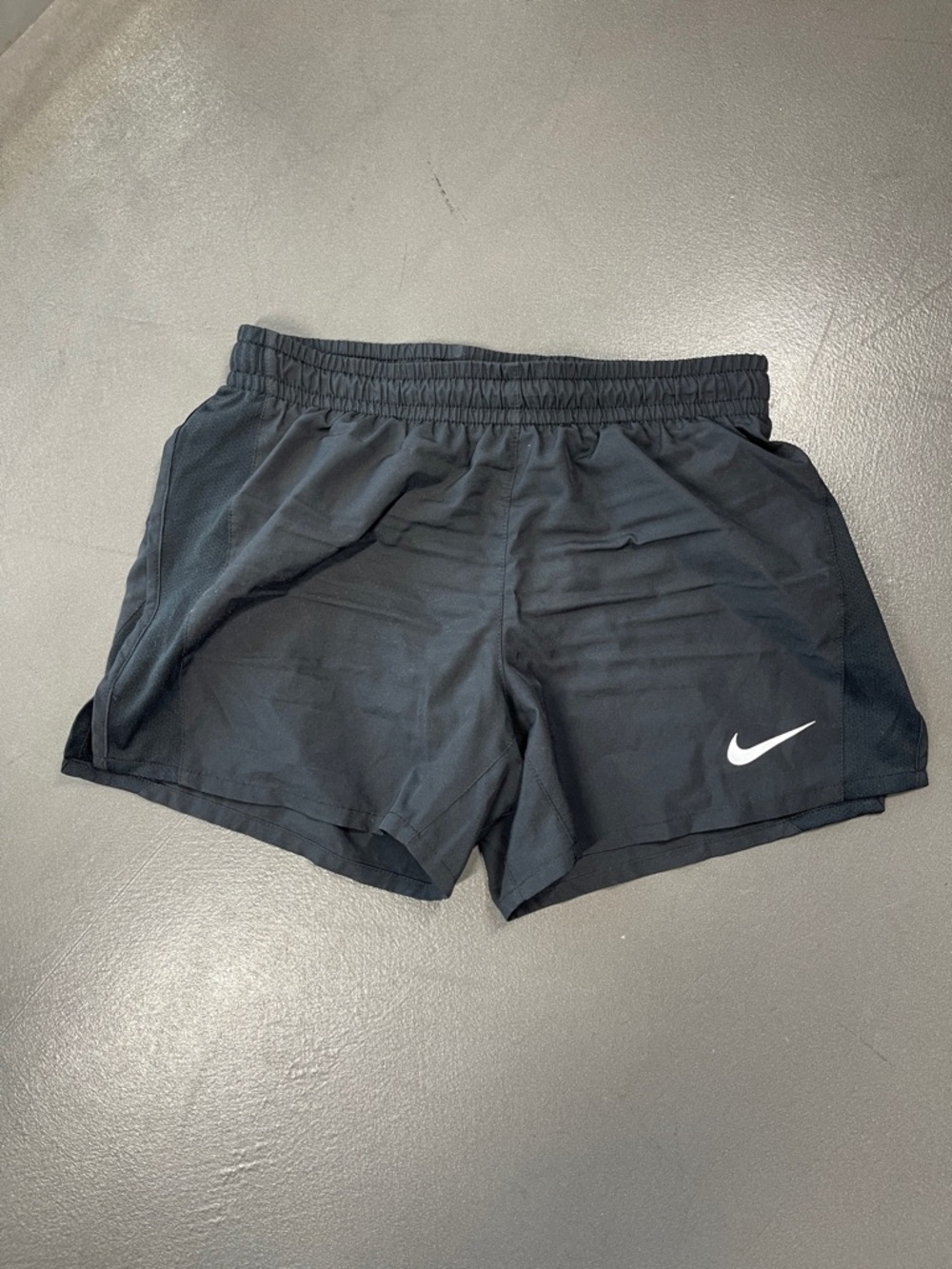 Nike Black Athletic Shorts with White Swoosh Boys Large 4” inseam